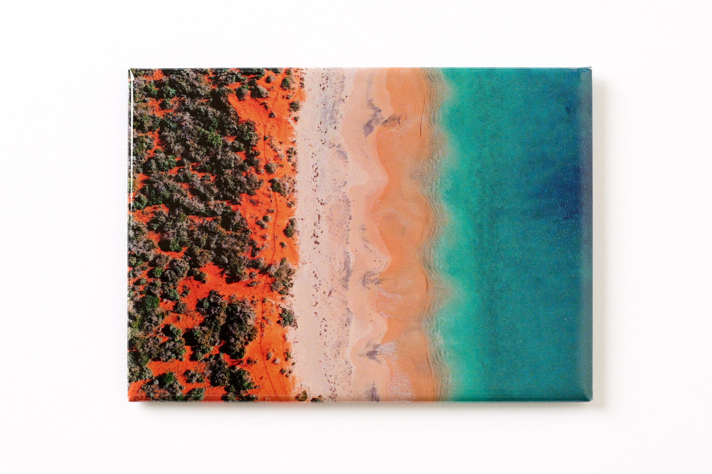 Australian Prints by Mackenzie Sweetnam. An aerial image of Bottle Bay, Western Australia on a fridge magnet.