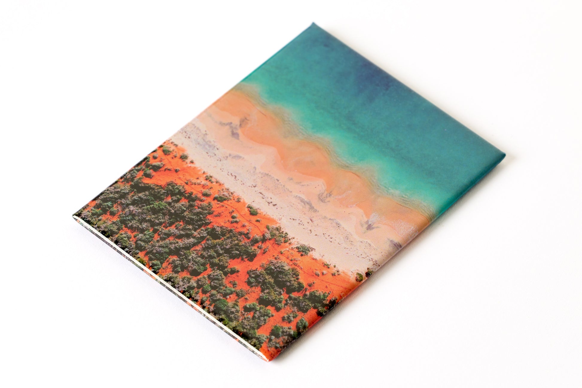 Australian Prints by Mackenzie Sweetnam. An aerial image of Bottle Bay, Western Australia on a fridge magnet.