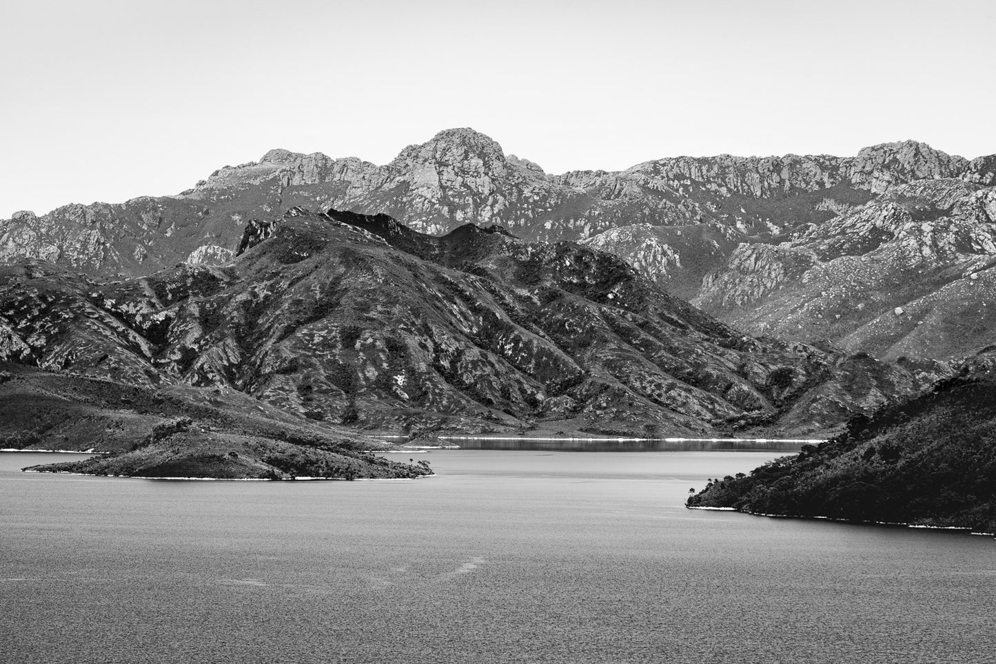 Australian Prints by Mackenzie Sweetnam. A scenic view of Lake Pedder, Tasmania, in Black and white 