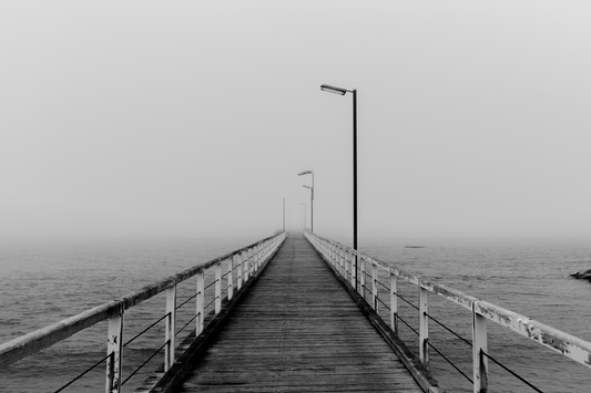 Australian Prints by Mackenzie Sweetnam. Beachport Pier in black and white on a misty day in South Australia.