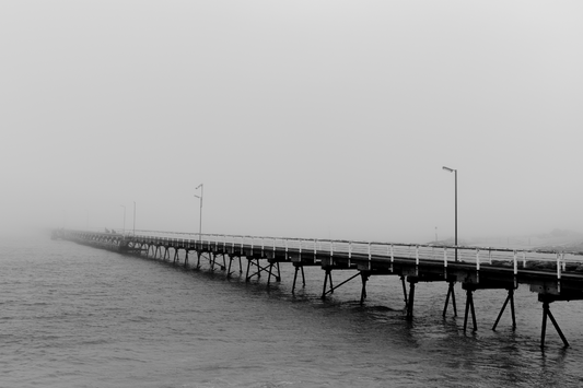 Australian Prints by Mackenzie Sweetnam. Beachport pier in black and white on a misty day in South Australia.