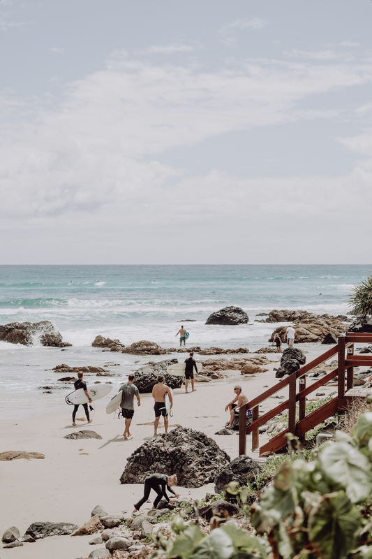 Australian Prints by Mackenzie Sweetnam. Surfers head out at Kirra Beach, Queensland.